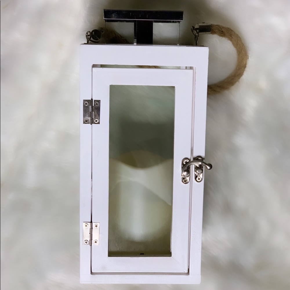 White and silver battery powered lantern